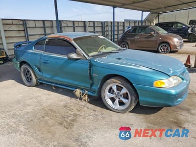 Czwarte zdjęcie samochodu z boku: 1997 FORD MUSTANG GT VIN:1FALP42X7VF116185 - miniatura