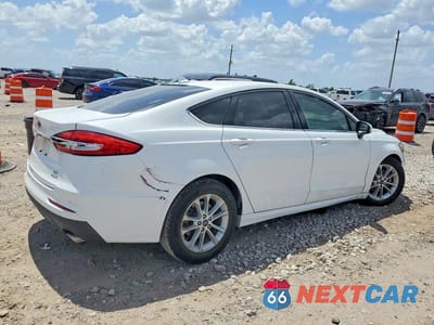 Trzecie zdjęcie samochodu z tyłu: 2019 FORD FUSION SE VIN:3FA6P0HD4KR171128 - miniatura