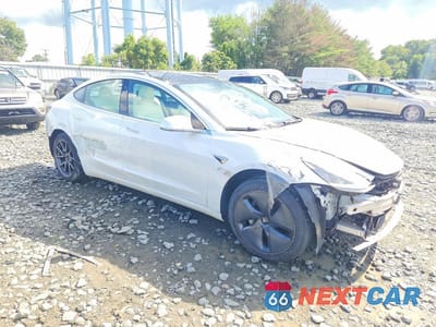 Czwarte zdjęcie samochodu z boku: 2020 TESLA MODEL 3 VIN:5YJ3E1EA7LF793311 - miniatura