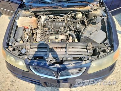 Zdjęcie 11 z 12 samochodu: 2002 PONTIAC BONNEVILLE SE VIN:1G2HX54K824236399 - miniatura