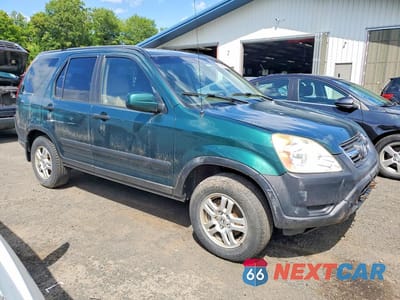 Czwarte zdjęcie samochodu z boku: 2002 HONDA CR-V EX VIN:JHLRD78852C014818 - miniatura