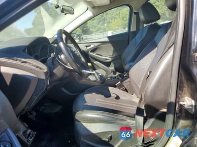 Zdjęcie 7 z 13 samochodu: 2013 FORD FOCUS TITANIUM VIN:1FADP3N23DL142166 - miniatura