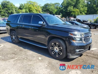Czwarte zdjęcie samochodu z boku: 2017 CHEVROLET SUBURBAN K1500 PREMIER VIN:1GNSKJKC0HR124221 - miniatura