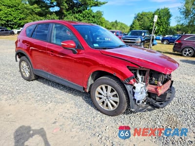 Czwarte zdjęcie samochodu z boku: 2016 MAZDA CX-5 TOURING VIN:JM3KE4CY6G0736557 - miniatura