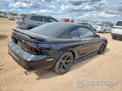 Trzecie zdjęcie samochodu z tyłu: 1997 FORD MUSTANG COBRA VIN:1FALP47VXVF203697 - miniatura