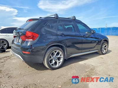 Trzecie zdjęcie samochodu z tyłu: 2013 BMW X1 SDRIVE28I VIN:WBAVM1C54DVW43254 - miniatura