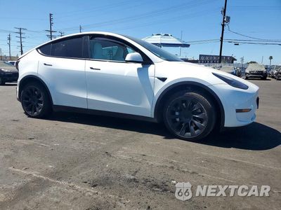 Czwarte zdjęcie samochodu z boku: 2023 TESLA MODEL Y VIN:7SAYGDEE9PF621925 - miniatura
