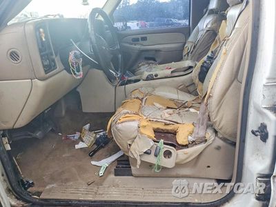 Zdjęcie 7 z 13 samochodu: 2001 CHEVROLET TAHOE C1500 VIN:1GNEC13T11J151635 - miniatura