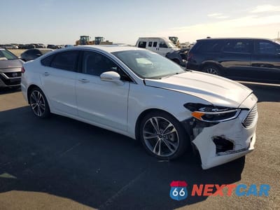 Czwarte zdjęcie samochodu z boku: 2020 FORD FUSION TITANIUM VIN:3FA6P0D95LR118344 - miniatura