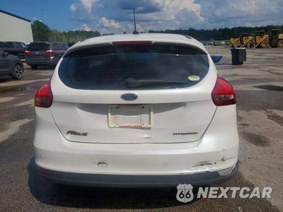Zdjęcie 6 z 12 samochodu: 2017 FORD FOCUS TITANIUM VIN:1FADP3N29HL279523 - miniatura
