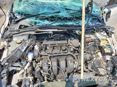 Zdjęcie 11 z 13 samochodu: 2013 FORD FOCUS TITANIUM VIN:1FADP3J26DL155161 - miniatura