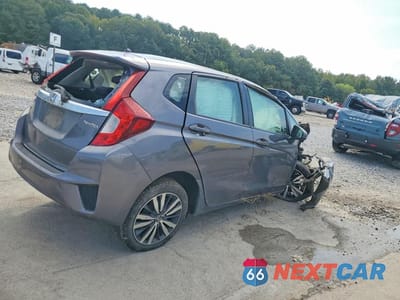 Trzecie zdjęcie samochodu z tyłu: 2015 HONDA FIT EX VIN:3HGGK5H8XFM762114 - miniatura