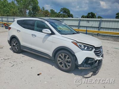 Czwarte zdjęcie samochodu z boku: 2017 HYUNDAI SANTA FE SPORT 2.0T ULTIMATE VIN:5NMZWDLA4HH041003 - miniatura