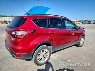 Trzecie zdjęcie samochodu z tyłu: 2018 FORD ESCAPE SEL VIN:1FMCU9HD0JUD44088 - miniatura