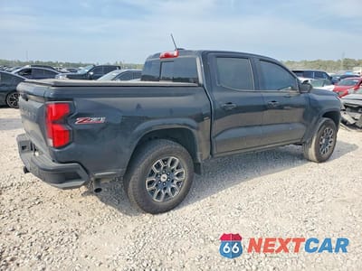 Trzecie zdjęcie samochodu z tyłu: 2024 CHEVROLET COLORADO Z71 VIN:1GCPTDEKXR1185222 - miniatura