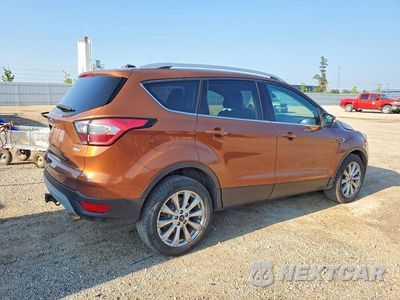 Trzecie zdjęcie samochodu z tyłu: 2017 FORD ESCAPE TITANIUM VIN:1FMCU9J93HUE21486 - miniatura