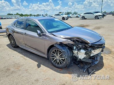 Czwarte zdjęcie samochodu z boku: 2024 TOYOTA CAMRY SE VIN:4T1G11AK8RU237158 - miniatura