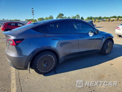 Trzecie zdjęcie samochodu z tyłu: 2023 TESLA MODEL Y VIN:7SAYGDEE2PA179048 - miniatura