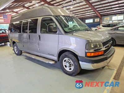 Czwarte zdjęcie samochodu z boku: 2012 CHEVROLET EXPRESS G3500 LT VIN:1GBZG1FG7C1148663 - miniatura