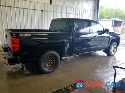 Trzecie zdjęcie samochodu z tyłu: 2017 CHEVROLET SILVERADO K1500 LT VIN:3GCUKREC3HG135371 - miniatura