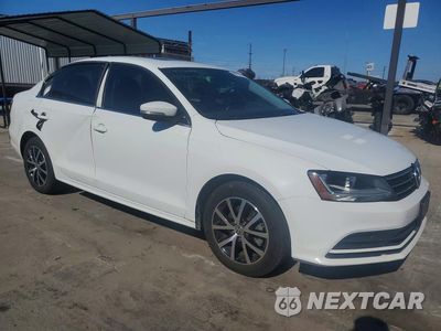 Czwarte zdjęcie samochodu z boku: 2017 VOLKSWAGEN JETTA SE VIN:3VWDB7AJXHM313171 - miniatura
