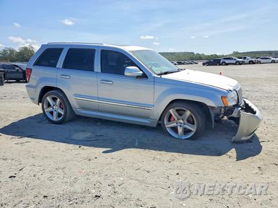 Czwarte zdjęcie samochodu z boku: 2006 JEEP GRAND CHEROKEE SRT-8 VIN:1J8HR78346C341112 - miniatura