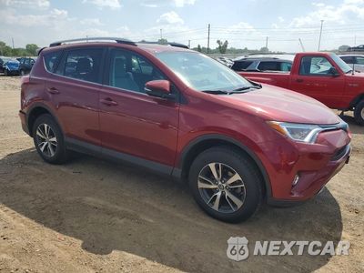 Czwarte zdjęcie samochodu z boku: 2018 TOYOTA RAV4 XLE VIN:2T3RFREV7JW712730 - miniatura