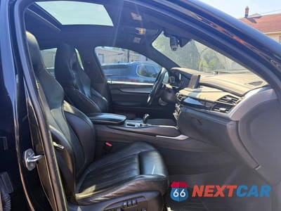 Zdjęcie 7 z 12 samochodu: 2016 BMW X6 M VIN:5YMKW8C55G0R43256 - miniatura