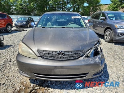 Piąte zdjęcie samochodu w środku: 2003 TOYOTA CAMRY LE VIN:4T1BE32K03U733930 - miniatura