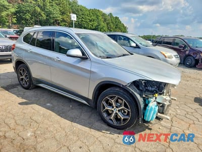 Czwarte zdjęcie samochodu z boku: 2018 BMW X1 SDRIVE28I VIN:WBXHU7C38J5L08191 - miniatura