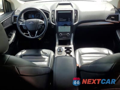 Zdjęcie 8 z 13 samochodu: 2023 FORD EDGE SEL VIN:2FMPK4J99PBA15386 - miniatura