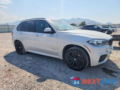 Czwarte zdjęcie samochodu z boku: 2017 BMW X5 XDR40E VIN:5UXKT0C53H0S79817 - miniatura