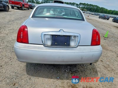 Zdjęcie 6 z 12 samochodu: 1998 LINCOLN TOWN CAR SIGNATURE VIN:1LNFM82W7WY665093 - miniatura