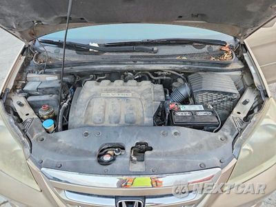 Zdjęcie 12 z 13 samochodu: 2005 HONDA ODYSSEY EX VIN:5FNRL38455B400118 - miniatura