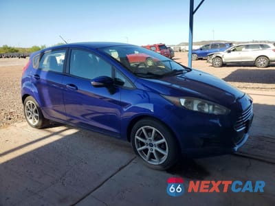 Czwarte zdjęcie samochodu z boku: 2015 FORD FIESTA SE VIN:3FADP4EJ5FM106087 - miniatura
