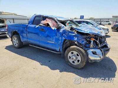 Czwarte zdjęcie samochodu z boku: 2017 TOYOTA TUNDRA SR5 VIN:5TFRM5F19HX119869 - miniatura