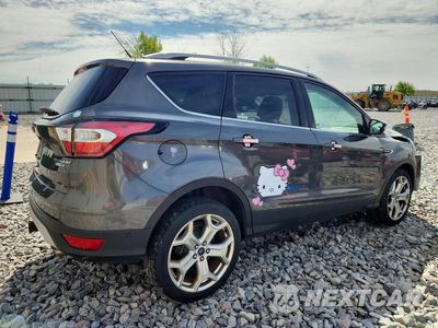 Trzecie zdjęcie samochodu z tyłu: 2017 FORD ESCAPE TITANIUM VIN:1FMCU9J92HUB97711 - miniatura