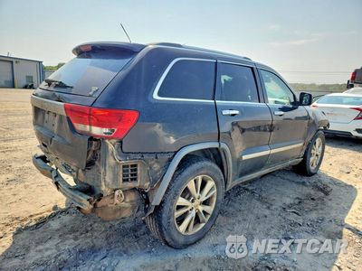 Trzecie zdjęcie samochodu z tyłu: 2013 JEEP GRAND CHEROKEE LAREDO VIN:1C4RJEAG3DC571631 - miniatura
