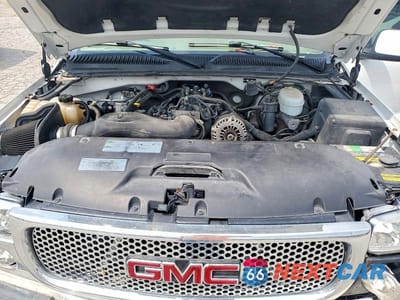 Zdjęcie 11 z 13 samochodu: 2006 GMC SIERRA K1500 DENALI VIN:2GTEK63N261115772 - miniatura