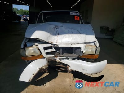 Piąte zdjęcie samochodu w środku: 1999 FORD RANGER VIN:1FTYR10C4XTA19314 - miniatura