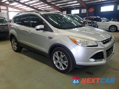 Czwarte zdjęcie samochodu z boku: 2013 FORD ESCAPE SEL VIN:1FMCU9H9XDUC51093 - miniatura