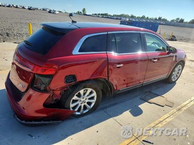 Trzecie zdjęcie samochodu z tyłu: 2013 LINCOLN MKT VIN:2LMHJ5FK6DBL57225 - miniatura