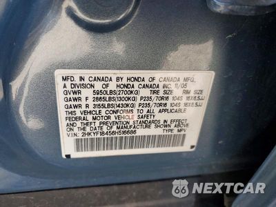 Zdjęcie 13 z 13 samochodu: 2006 HONDA PILOT EX VIN:2HKYF18456H516686 - miniatura