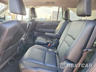 Zdjęcie 11 z 13 samochodu: 2022 HONDA PILOT TOURING VIN:5FNYF6H64NB034545 - miniatura
