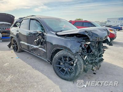 Czwarte zdjęcie samochodu z boku: 2017 JEEP GRAND CHEROKEE TRAILHAWK VIN:1C4RJFLG6HC674258 - miniatura