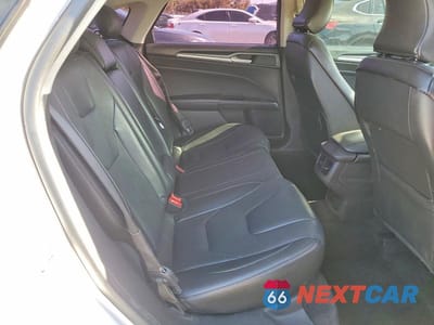Zdjęcie 10 z 12 samochodu: 2016 FORD FUSION TITANIUM PHEV VIN:3FA6P0SU5GR157013 - miniatura
