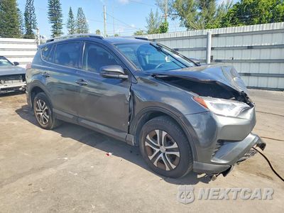 Czwarte zdjęcie samochodu z boku: 2016 TOYOTA RAV4 LE VIN:JTMZFREV9GJ083575 - miniatura