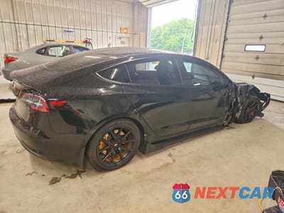 Trzecie zdjęcie samochodu z tyłu: 2022 TESLA MODEL 3 VIN:5YJ3E1EB1NF107596 - miniatura