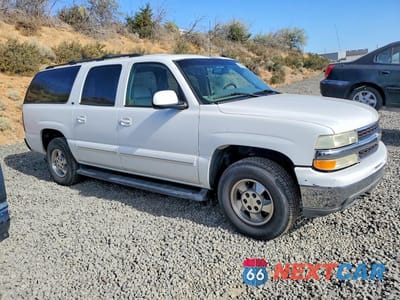 Czwarte zdjęcie samochodu z boku: 2002 CHEVROLET SUBURBAN K1500 VIN:3GNFK16T62G350816 - miniatura