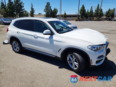 Czwarte zdjęcie samochodu z boku: 2021 BMW X3 SDRIVE30I VIN:5UXTY3C06M9E14132 - miniatura